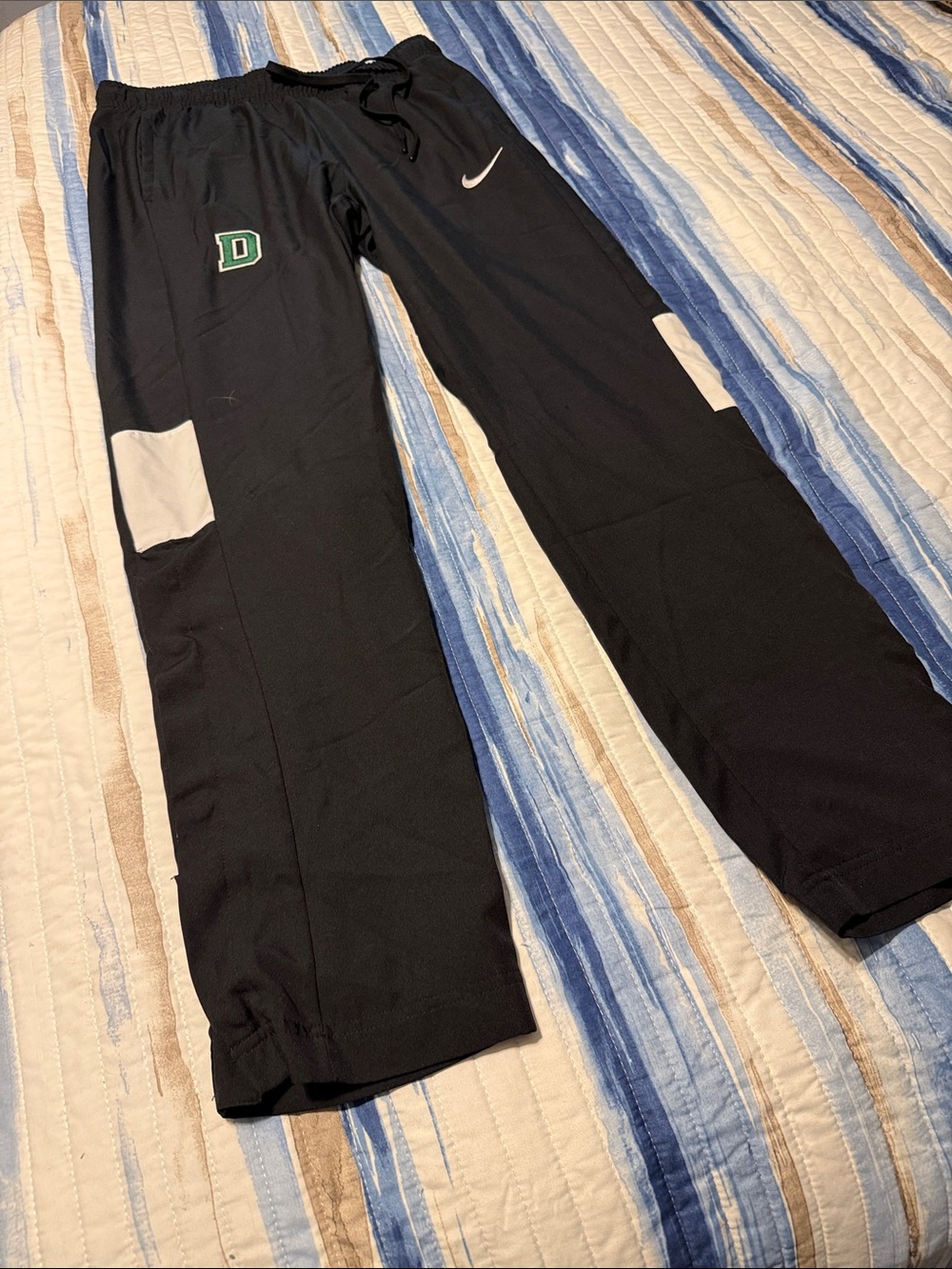Nike Black Sweatpants with White Panels and Green D Patch